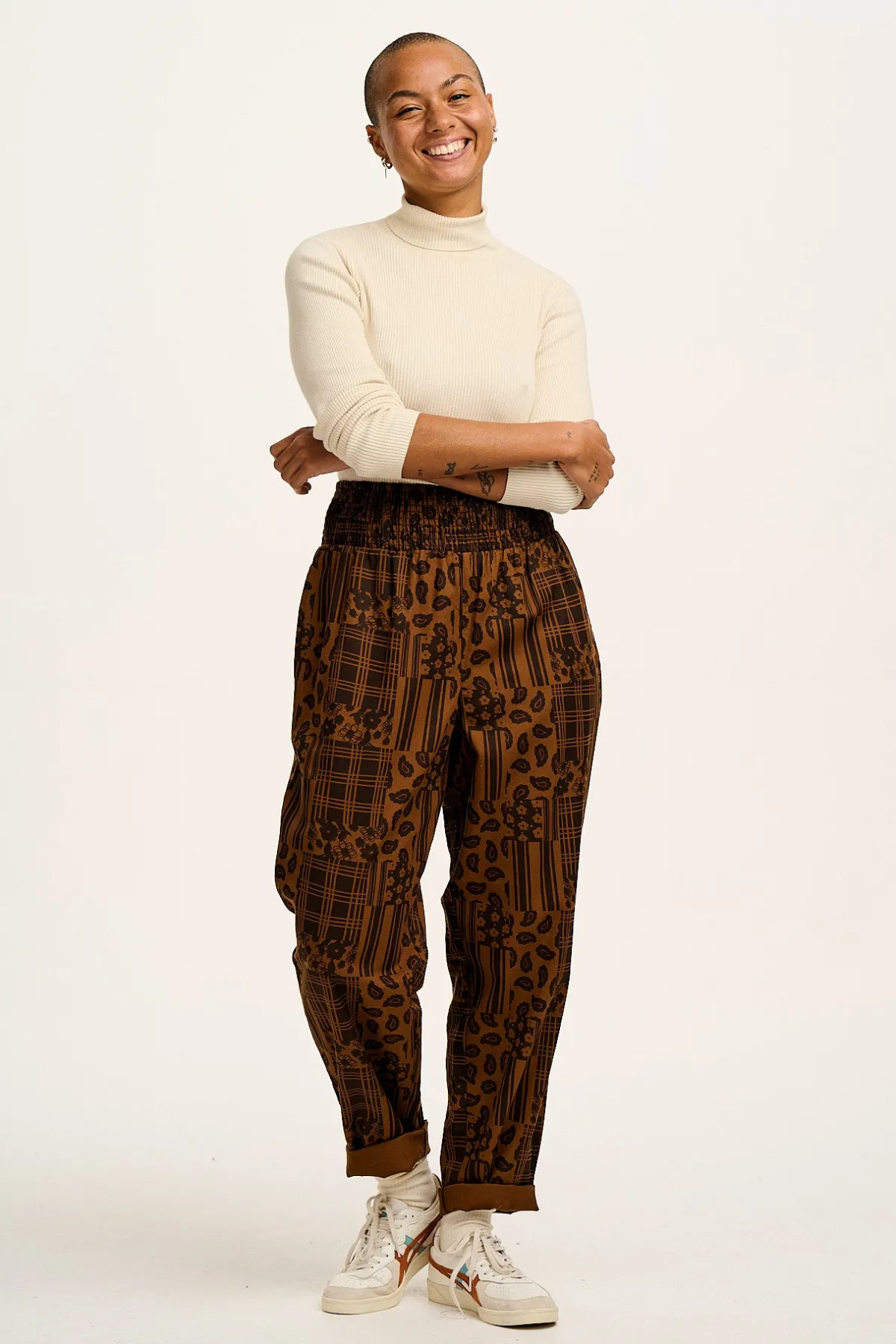 alexa__cotton_trousers_in_brown_penny_patchwork_print_2.webp Lucy & Yak Alexa - Cotton Trousers in Brown Penny Patchwork Print